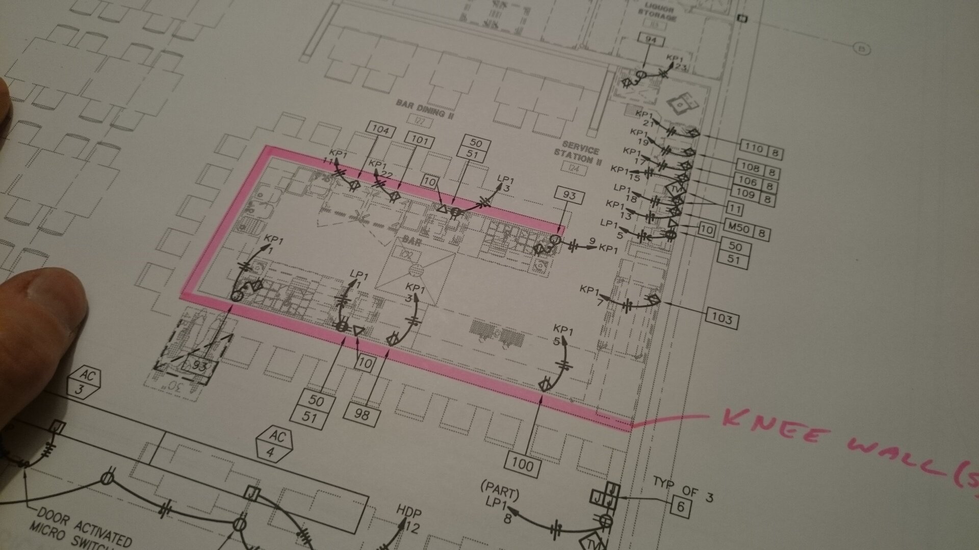 Electrician working on commercial electrical panel